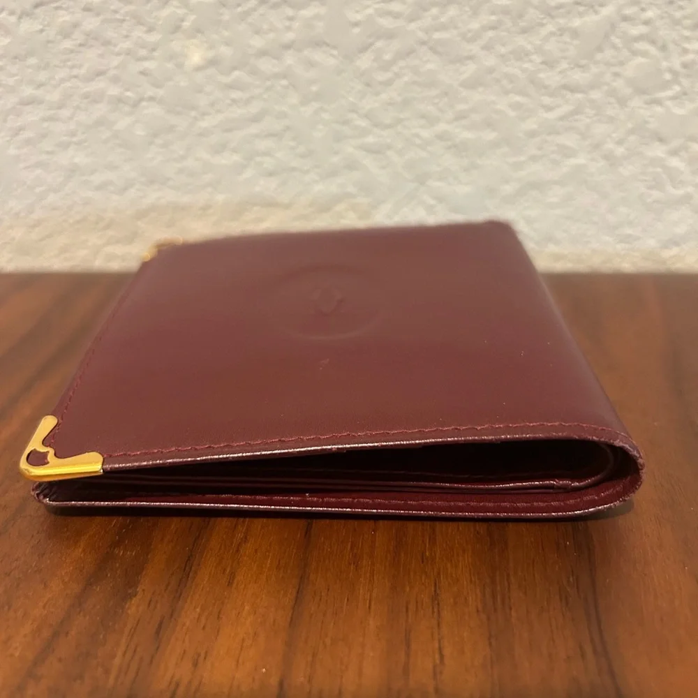 Cartier Burgundy Leather Wallet with Gold Corner Accents